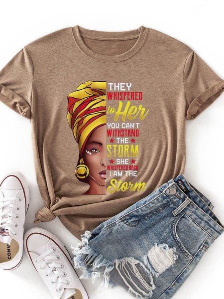 

They Whispered To Her You Can`t Withstand The Storm She Whispered Back I Am The Storm Graphic Tee, Khaki, T-shirts