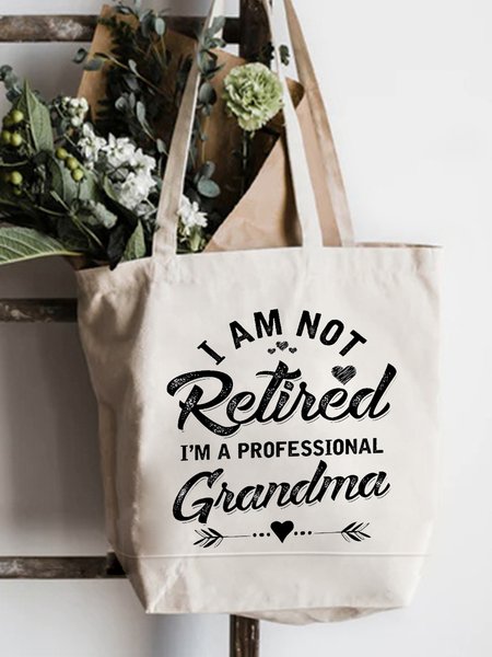 

Not Retired But A Professional Grandma Printed Letter Shopping Tote, White, Bags