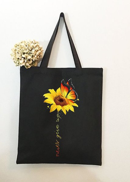 

Never Give Up Sunflower Butterfly Plant Graphic Shopping Tote, Black, Bags