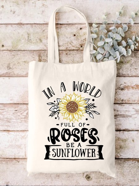

In A World Full Of Roses Be A Sunflower Plant Graphic Shopping Tote, White, Bags