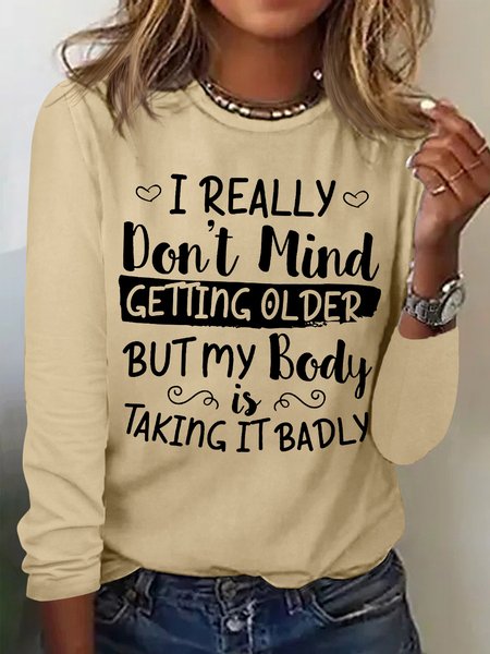 

Women’s I Really Don’t Mind Getting Older But My Body Is Taking It Badly Casual Crew Neck Text Letters Shirt, Khaki, Long sleeves