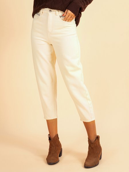 

White embroidered jeans washed with water, Pants